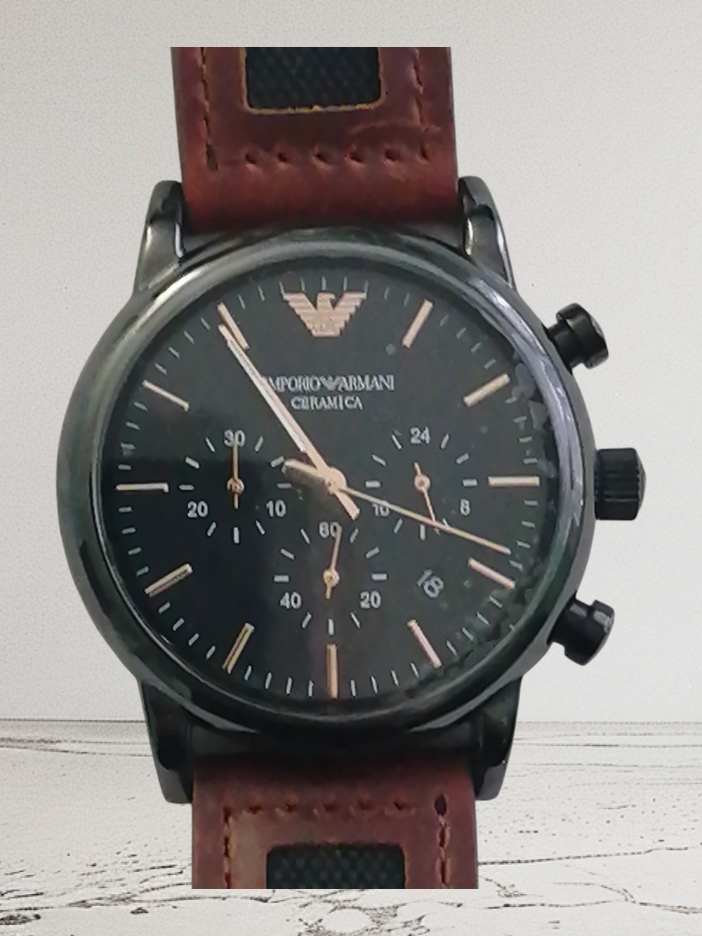 Emporio Armani Men’s Black Dial Chronograph Watch with Brown Strap